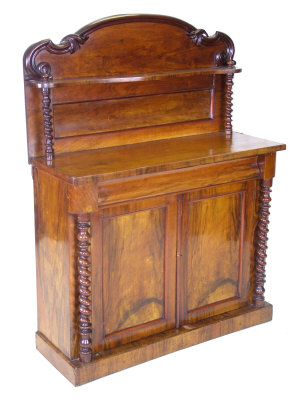 Appraisal: A Victorian mahogany chiffoiner the raised shaped back with scrolling