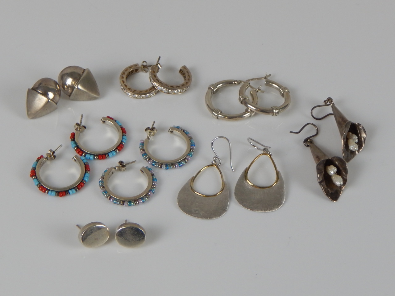 Appraisal: A quantity of earrings some white metal in various designs