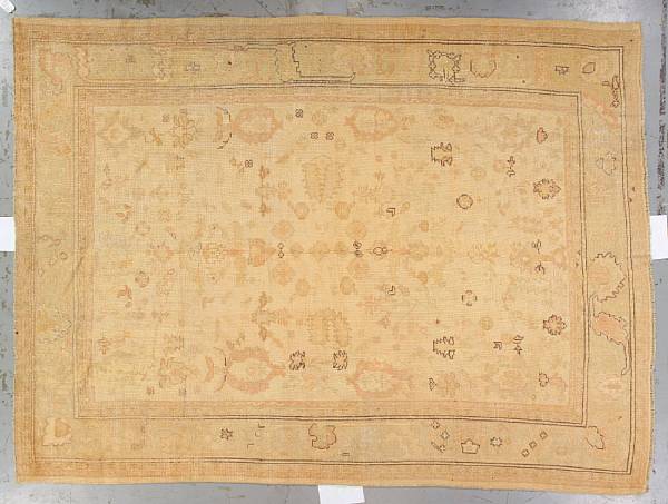 Appraisal: An Oushak carpet Anatolia late th century size approximately ft