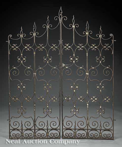 Appraisal: A Pair of Spanish-Style Wrought Iron Gates arched top with