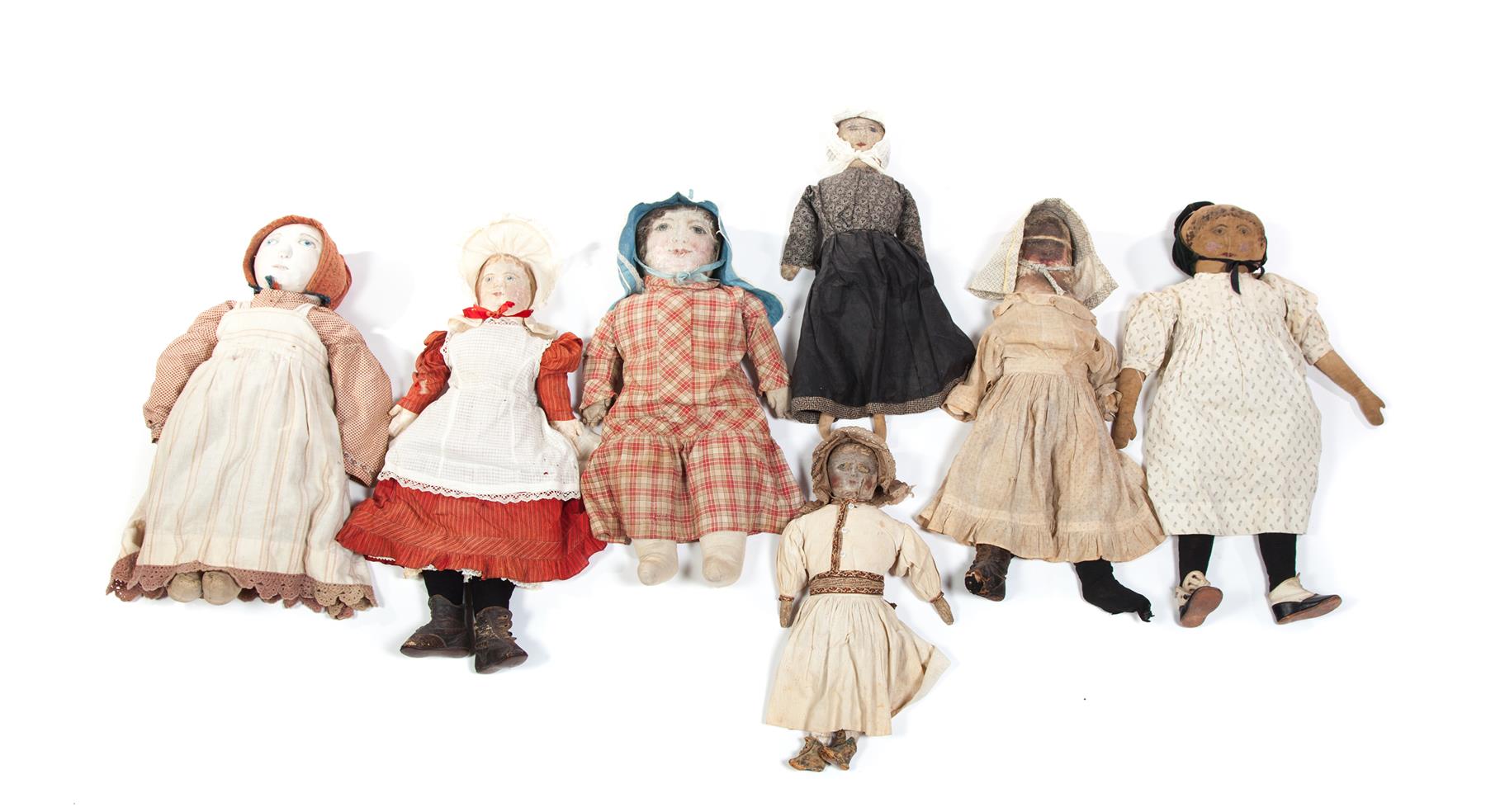 Appraisal: SEVEN CLOTH DOLLS WITH PAINTED FACES American late th-early th