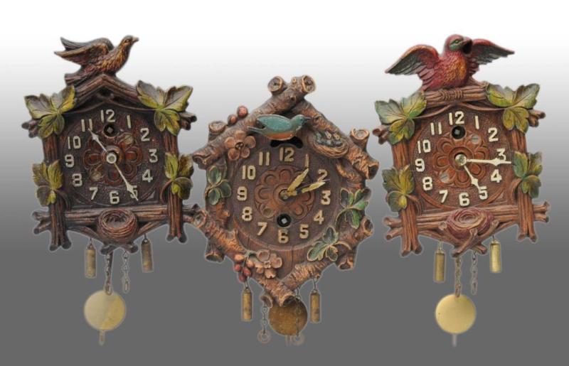 Appraisal: Lot of Miniature Figural Novelty Clocks Description Includes a bluebird