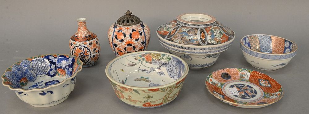 Appraisal: Seven Imari porcelain pieces to include large covered bowl scallop