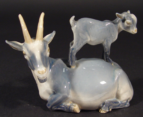 Appraisal: Royal Copenhagen porcelain goat and kid with hand painted decoration