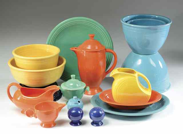 Appraisal: FIESTA POTTERY SERVING PIECES assorted colors some marked round platters