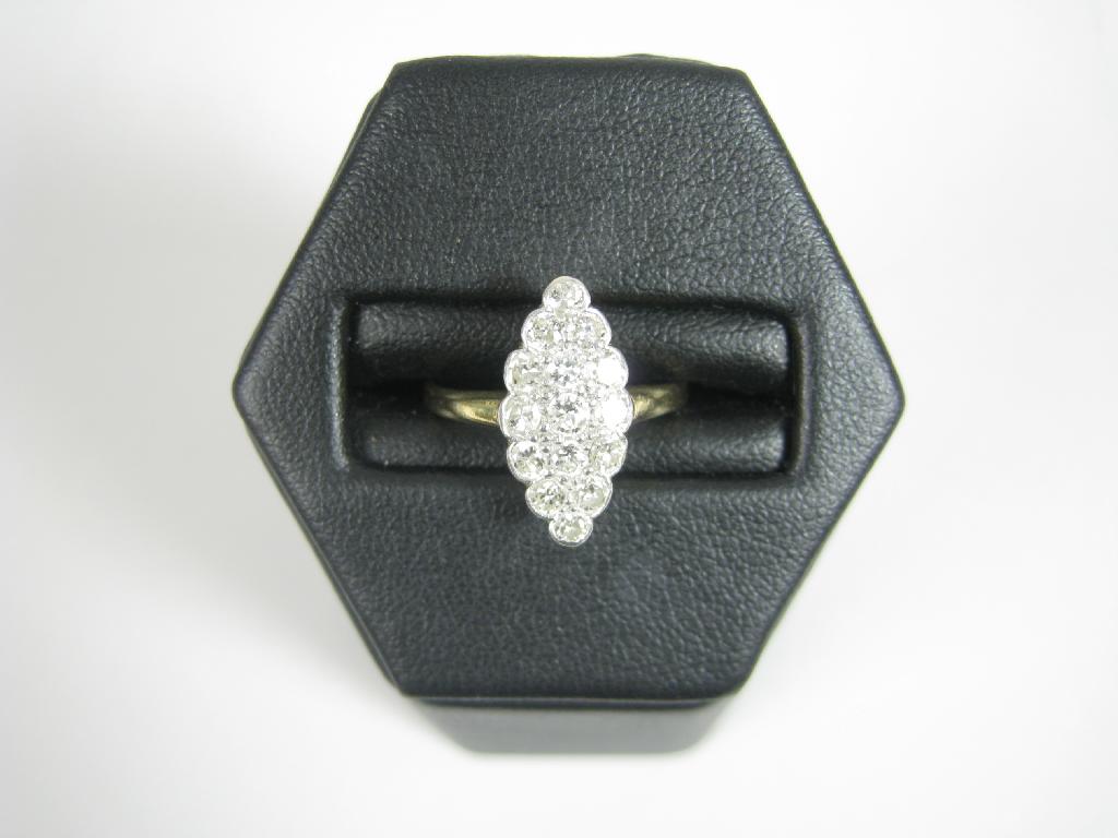 Appraisal: A Diamond Cocktail Ring the marquise shaped plaque millegrain-set fifteen