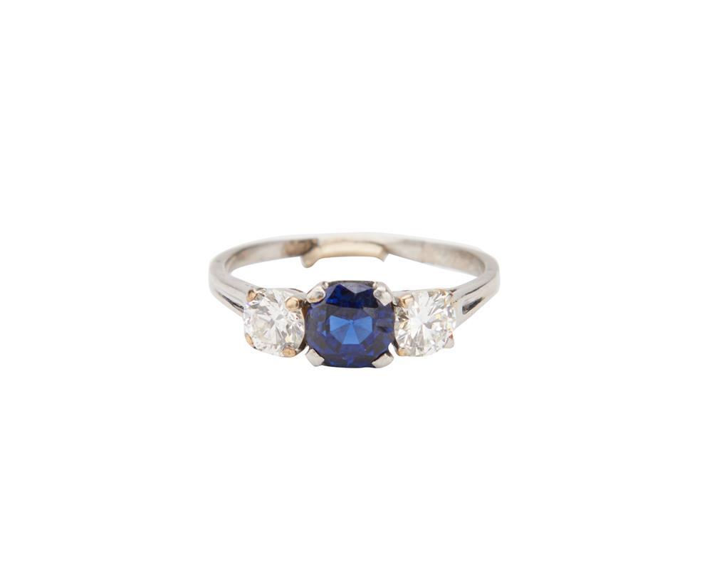 Appraisal: Platinum Sapphire and Diamond Ring centering a circle-cut sapphire measuring