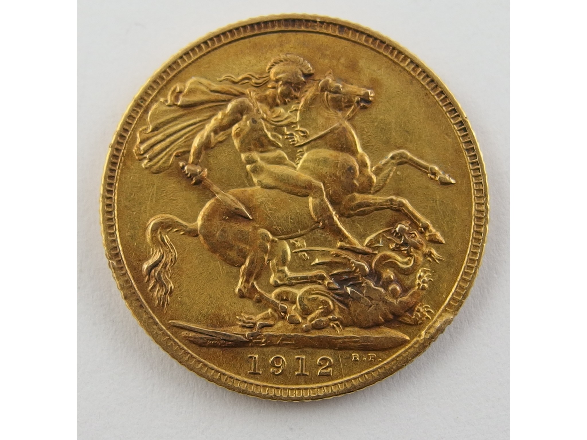 Appraisal: George V gold sovereign very fine with edge knock