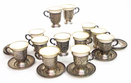 Appraisal: Twelve sterling silver coffee cup holders and saucersalbert j gannon