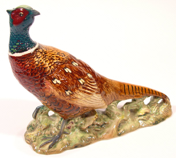 Appraisal: Large Beswick pheasant with hand painted decoration printed and impressed