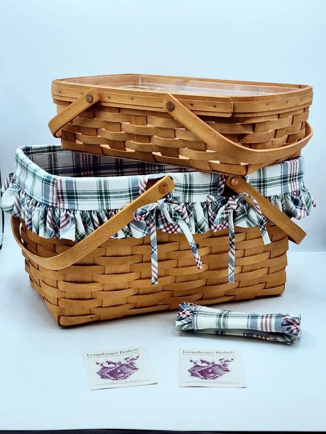 Appraisal: Longaberger Baskets including the Large Market Basket with plastic protector