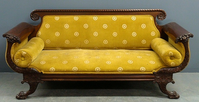 Appraisal: - Empire mahogany sofa with rosette carved back acanthus carved