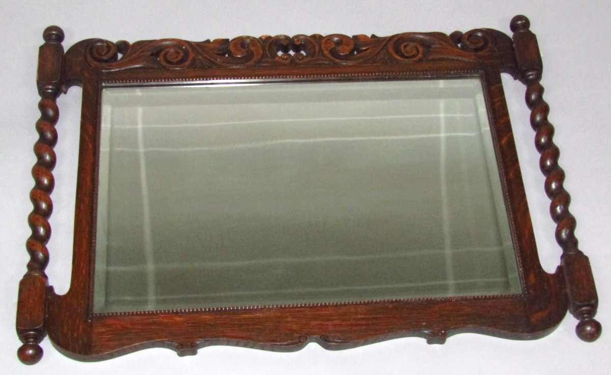 Appraisal: An early thC oak framed mirror the rectangular plain glass