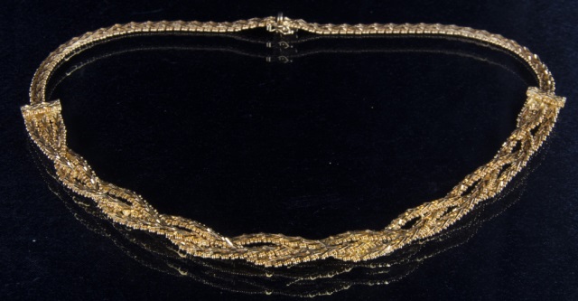 Appraisal: K Gold NecklaceBraided foxtail style Triple strand Excellent condition Troy