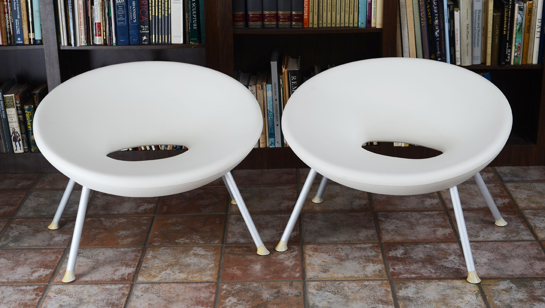 Appraisal: PAIR PHILIPPE STARCK FOR KARTELL PLOOF ARMCHAIRS Molded white plastic