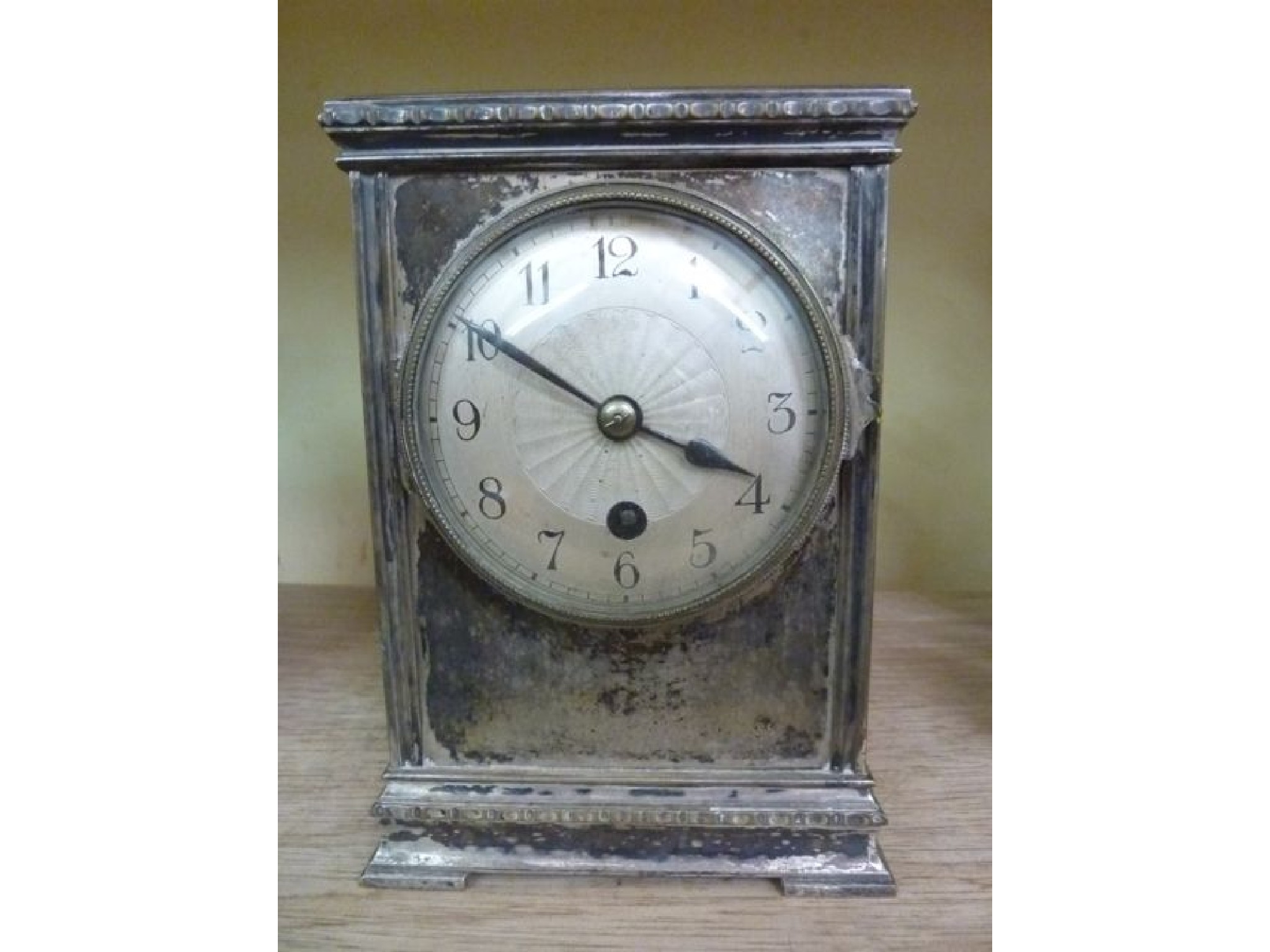 Appraisal: An Edwardian mantle clock in a silver plated case with