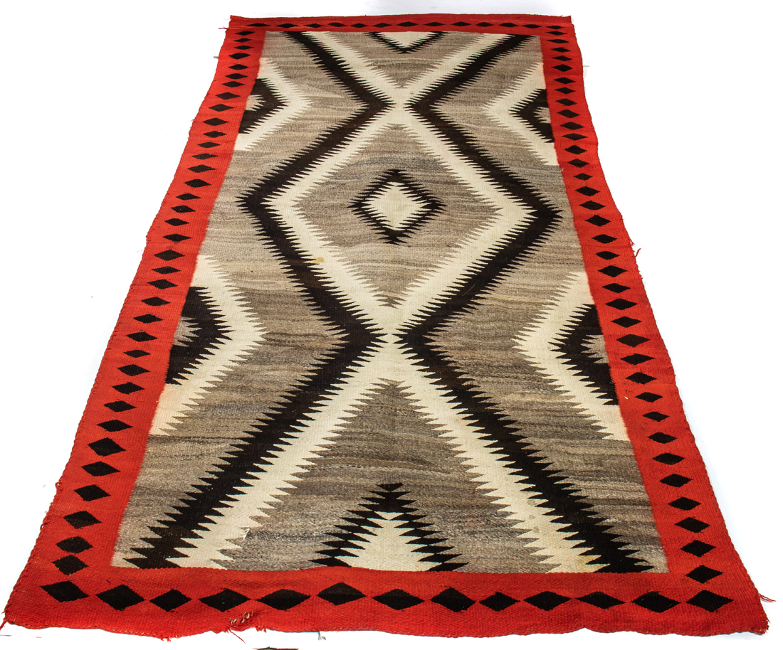 Appraisal: A NAVAJO EYE DAZZLER RUG A Navajo Eye Dazzler rug