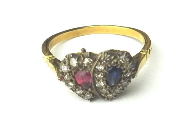 Appraisal: A gold diamond ruby and sapphire set ring in a