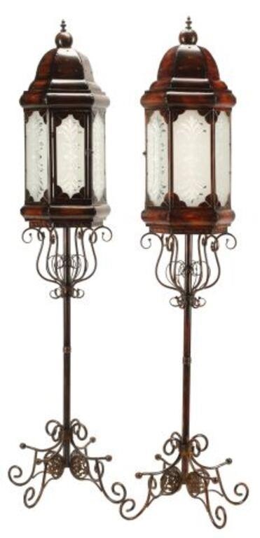 Appraisal: pair Wrought iron and tole floor lanterns single interior candle