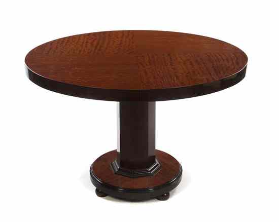 Appraisal: An Art Deco Mahogany Games Table having a double circular