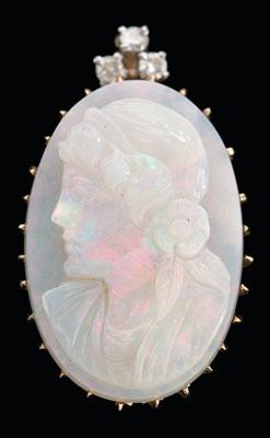 Appraisal: Carved opal pendant oval tablet-cut natural white opal x x