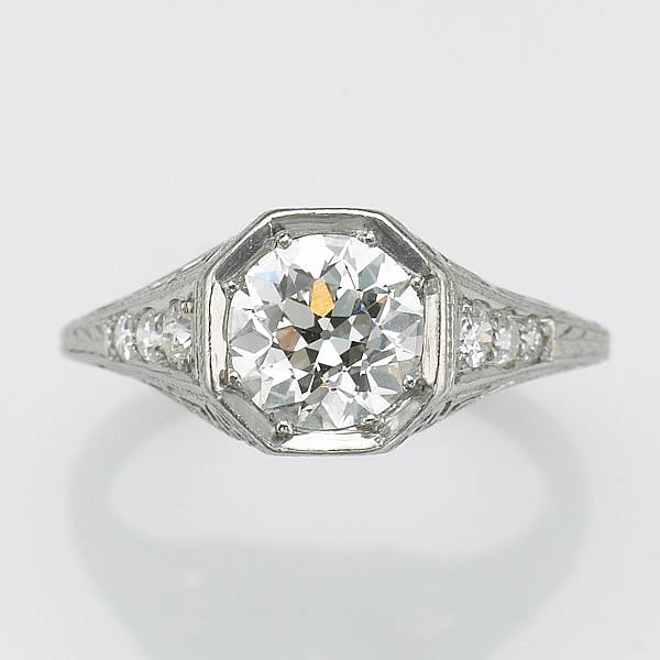 Appraisal: A diamond and platinum ring European-cut weighing an estimated ct