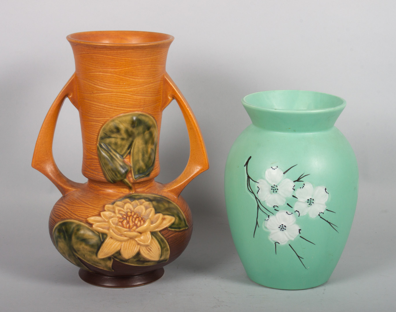 Appraisal: Two American art pottery vases Roseville double-handled vase in the