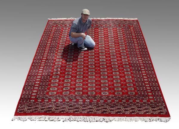 Appraisal: HAND TIED PAKISTANI BOKHARA RUG Approx ' '' x '