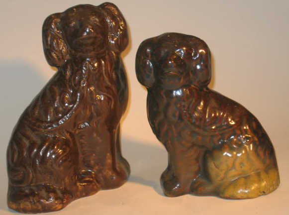 Appraisal: TWO AMERICAN TH CENTURY POTTERY SPANIELS Both seated facing to