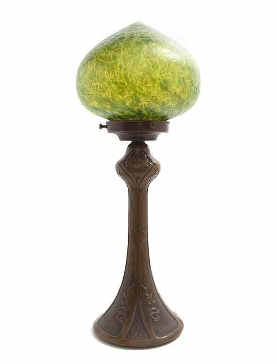 Appraisal: A Loetz Glass and Cast Metal Table Lamp the domed