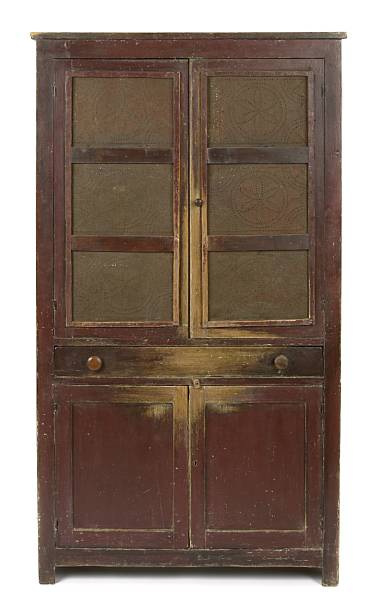 Appraisal: An American paint decorated wood and pierced metal hutch pie