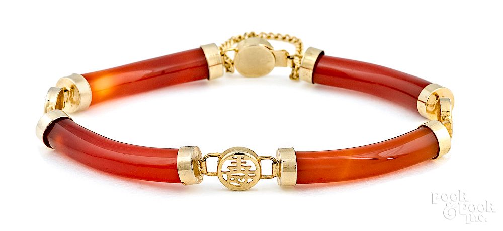 Appraisal: K yellow gold orange jade link bracelet Exclusive on Bidsquare