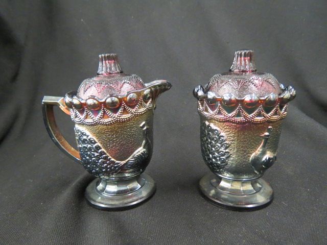 Appraisal: Carnival Glass Sugar Creamer peacock design amethyst excellent