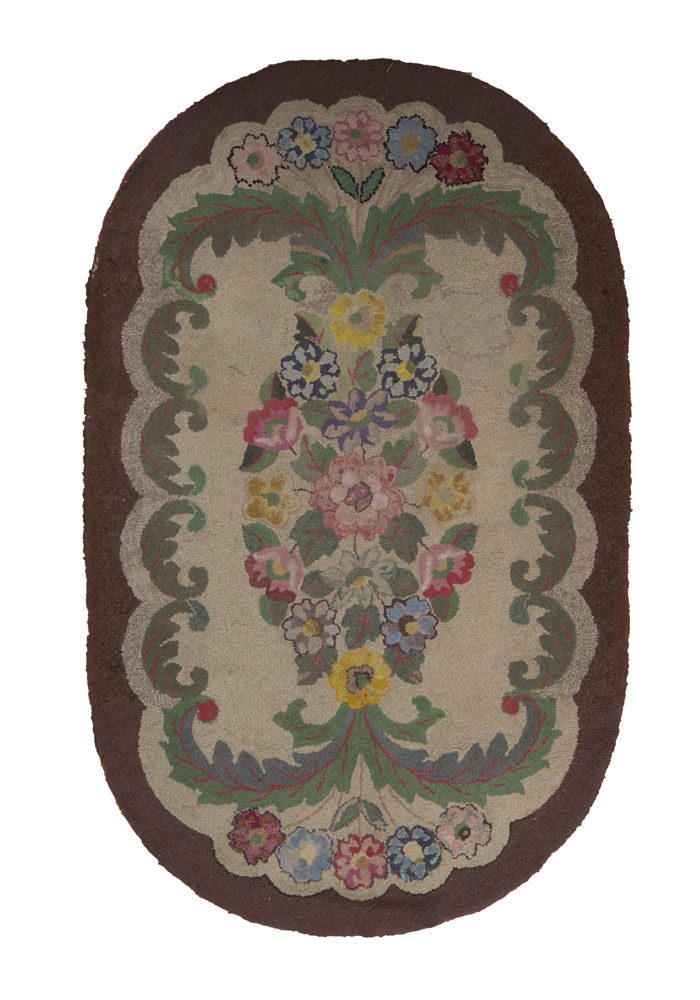 Appraisal: GROUP OF FIVE HOOKED RUGS AND A MACHINE-WOVEN RUG One