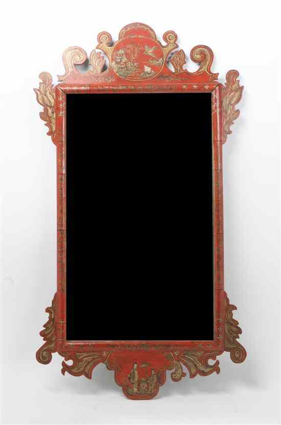 Appraisal: A Carved and Lacquered Mirror the beveled plate set within