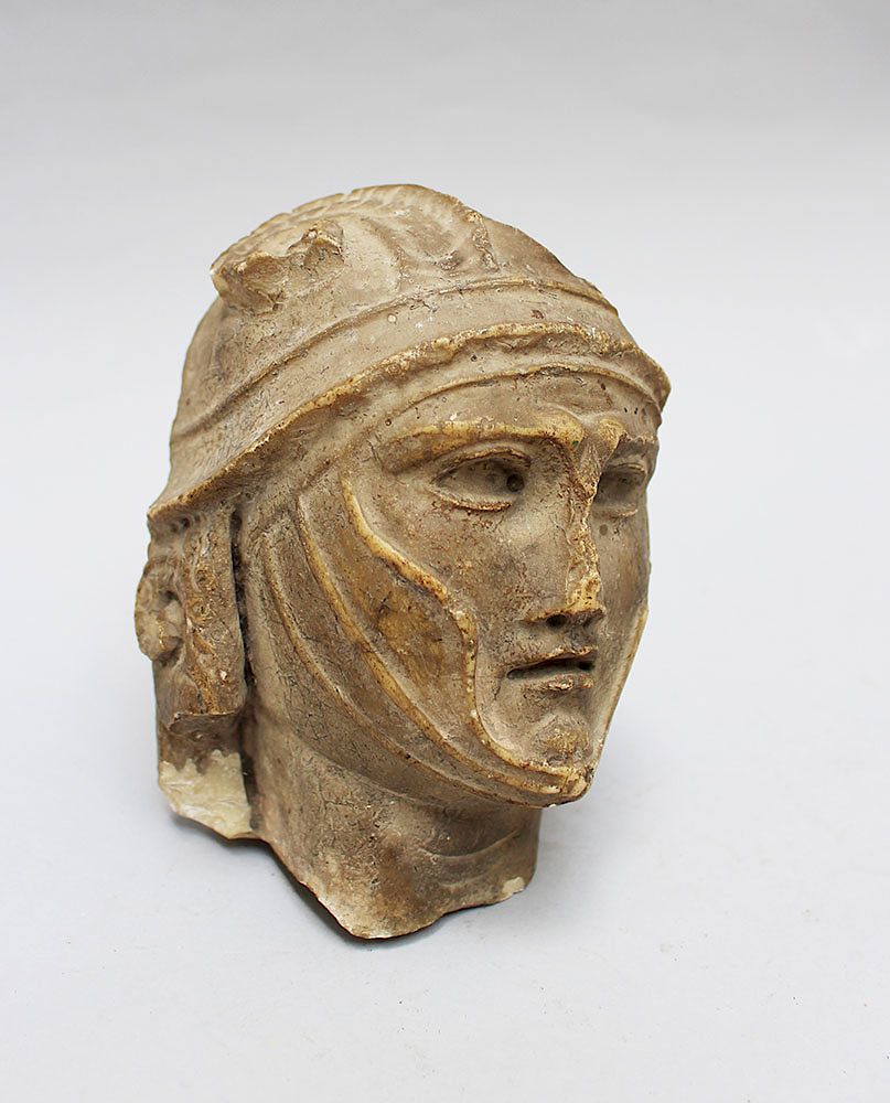 Appraisal: Male Stone Head Male Stone Head of a roman soldier