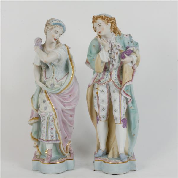 Appraisal: Pair of German Kalk hand painted bisque figures of a