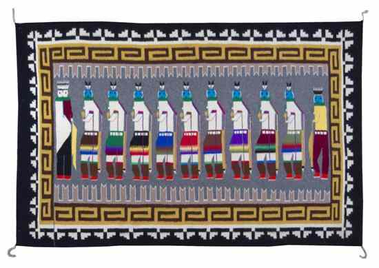 Appraisal: A Navajo Weaving Yei-bi-Chai nine Yei-bi-Chai with a leader and