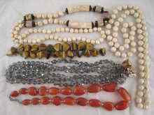 Appraisal: Three bead necklaces together with two tiger's eye bracelets