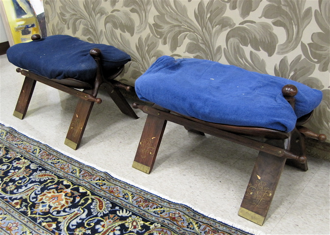 Appraisal: PAIR OF KASHMIR CAMEL SADDLE STOOLS of solid rosewood construction