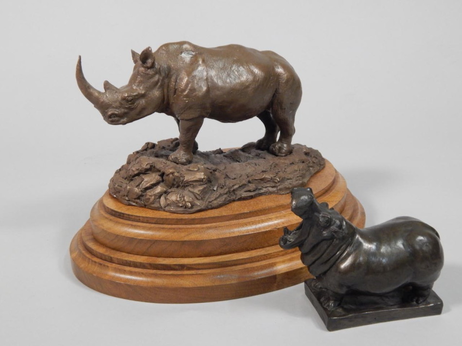 Appraisal: thC School A bronze resin figure of a Rhino on