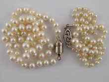 Appraisal: A cultured pearl necklace measuring approx cm together with a