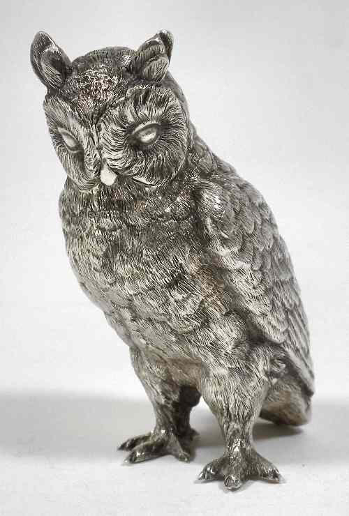 Appraisal: An Elizabeth II cast silver figure of an owl ins