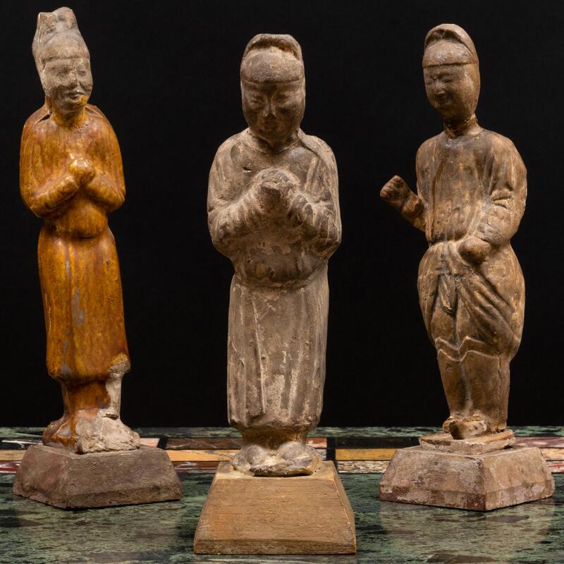 Appraisal: Group of Three Chinese Pottery Figures of Attendants Raised on