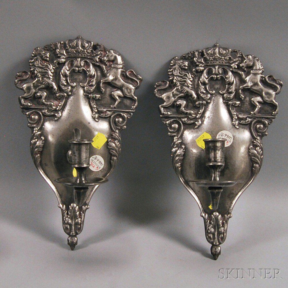 Appraisal: Pair of Pewter Sconces th th century decorated with the