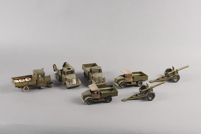 Appraisal: Lot of military trucks and cannons Trucks are Britains repainted