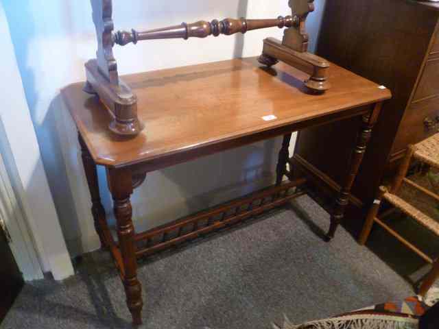 Appraisal: A LATE VICTORIAN WALNUT OCCASIONAL TABLE of rectangular form on