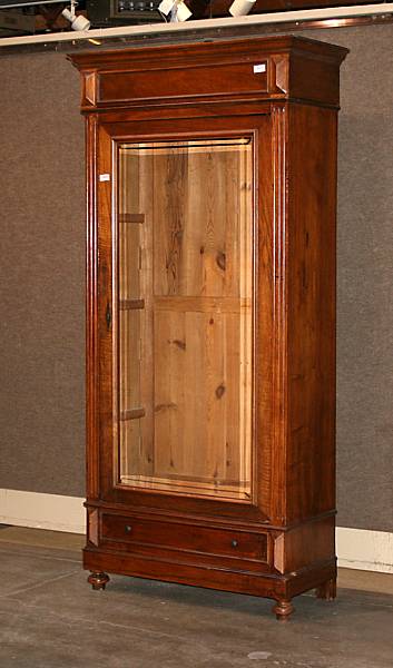 Appraisal: A Neoclassical style walnut bookcase height ft in width in