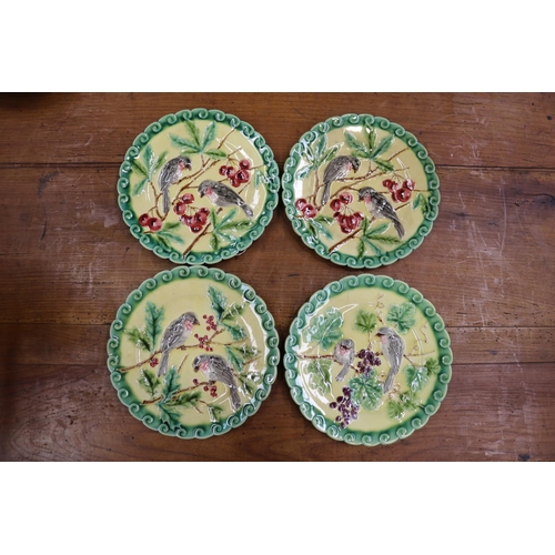 Appraisal: Set of four antique French Sarreguemines bird plates each approx