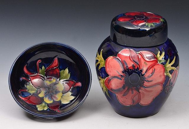 Appraisal: Moorcroft small ginger jar and bowlwith floral design on a